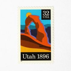 a stamp with an image of a rock formation in the desert, and text that reads utah