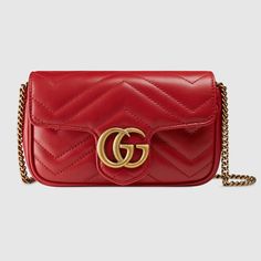 The Gg Marmont Mini Bag Has A Key Ring That Can Be Used To Attach It. Hibiscus Red Matelasse Chevron Leather With Hibiscus Red Leather Detail Gold-Toned Hardware Attached Key Ring That Can Attach To A Separate Bag Double G Chain Shoulder Strap With 23.5" Drop This Item Can Fit A Cell Phone Up To 2.7"W X 5.8"H X .3"D The Gucci Card Case Wallet Will Fit Inside This Product Weight: .35kg Approximately Super Mini Size: 6.5"W X 4"H X 2"D Made In Italy The Model Is 5'11" Tall Gg Marmont Mini Bag, Gucci Marmont Mini, Gucci Mini Bag, Cheap Designer Bags, Gucci Gg Marmont Matelasse, Gucci Mini, Gucci Gifts, Gucci Marmont, Gucci Gg Marmont