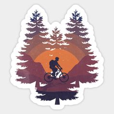 a person riding a bike in the woods with trees and sun behind them on a sticker