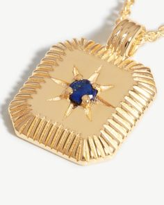 Star Ridge Birthstone Pendant Necklace | 18k Gold Vermeil/Lapis Lapis/September. Bring Your Birth Month a Whole New Meaning with a Personalized Gemstone Necklace. The Ridged Pendant, Held on a Short Chain Necklace, Holds a Natural Lapis Stone, Symbolizing Strength and Courage, and is Embellished with a Central Star Motif. The Perfect Gift for Anyone Born in September. Please Note: Engraving Items May Take 2 Working Days to Process. Metal: 18K Recycled Gold Plated Vermeil on Recycled Sterling Sil Gold Sapphire Jewelry Gift, Gold Sapphire Jewelry For Gift, Celestial Sapphire Pendant Jewelry, Gold Celestial Necklace With Polished Finish, Gold Sapphire Gemstone Jewelry, Sapphire Birthstone Gold Plated Jewelry, Gold-plated Sapphire Birthstone Jewelry, Gold Celestial Jewelry With Rectangular Pendant, Celestial Gold Gemstone Jewelry