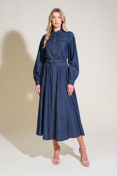 A light weight denim midi dress featuring shirt collar, button down, front pockets, long sleeve, self belt and full skirt Details: Self : 100% Cotton Size & Fit - Model is 5`8" And Wearing Size Small- Measurements Taken From Size Small- Approx. Length: 50" Fall Denim Midi Dress With Button Closure, Spring Denim Dress With Buttoned Pockets For Work, Fall Midi Denim Dress With Button Closure, Chic Belted Button-up Denim Dress, Spring Collared Belted Denim Dress, Denim Midi Dress With Pockets For Daywear, Midi-length Denim Dress With Pockets For Daywear, Midi Denim Dress With Pockets For Daywear, Spring Midi Dress Medium Wash For Work