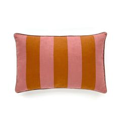 an orange and pink striped pillow on a white background