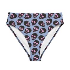 High-waisted bikini bottom featuring a punk pattern of neon black and pink skulls on a light blue background Trendy Black Bottoms With Skull Print, Punk Bottoms With Skull Print For Halloween, Blue Punk Bottoms For Summer, Fitted Blue Bottoms For Rave, Fitted Graphic Print Bottoms For The Beach, High Waist Blue Bottoms With Graphic Print, Fitted Punk Blue Bottoms, Punk Halloween Bottoms With Skull Print, Fitted Graphic Print Beach Bottoms