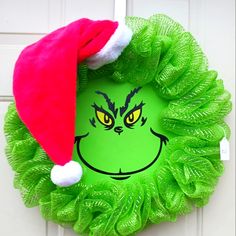 a grin face wreath hanging on the front door