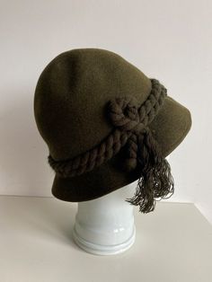 Vintage knitted hat in moss green colourEstimated Size: smallInside circumference - 21.5"/ 54.5 cmPlease check measurements to insure a proper fit. Remember to allow yourself some extra room for movement. You can compare these with something from your closet that fits you well.This hat will come to you freshly laundered and ready to wear.Please feel free contact me if you need additional measurements or have any questionsCondition: very good vintage conditionSHIPPING* I ship worldwide via Priori Spring Hat, Wool Fedora Hat, Spring Hats, Hat Wool, Green Hat, Wool Fedora, Classic Hats, Green Hats, Winter Hats For Women