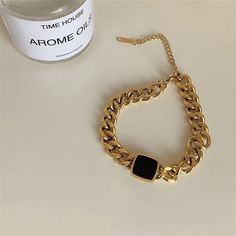 Complete your look with this elegant curb chain bracelet featuring a simple square charm. Chain : 6.69" L with 1.97" extender Charm : 0.51" W x 0.51" H Lobster claw clasp 18k gold-plated stainless steel / enamel Roman Numeral Bracelet, Popular Bracelets, Thick Chain Necklace, Rose Gold Charms, Titanium Bracelet, Wrist Jewelry, Party Necklace, Gold Charm Bracelet, Square Pendant