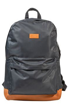 This retro-cool water-resistant nylon backpack features a dedicated storage pockets to keep your essentials safe and tidy. 13" x 19" x 7" Water-resistant Single top handle, dual adjustable shoulder straps
 Zip around closure Exterior has front zip pocket, soft-touch pocket for glasses, earphones pass-through slot Interior has key clasp, USB charging port Fits a 15" laptop Nylon/polyester/plastic Imported Packable Nylon Backpack For Everyday Use, Everyday Nylon Packable Backpack, Functional Nylon Packable Backpack, Nylon Backpack With Adjustable Straps, Waterproof Nylon Softback Bag, Packable Nylon Backpack, Nylon Softback Backpack With Adjustable Straps, Gray Nylon School Backpack, Nylon Softback Backpack For Outdoor