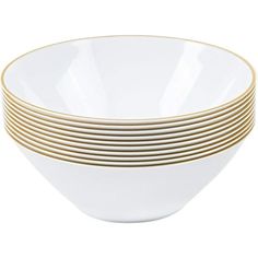 six white and gold plates stacked on top of each other