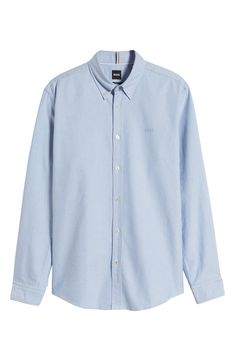 Comfortable and versatile, this solid-color shirt tailored from soft cotton looks great whether you wear it tucked or untucked. 29" length; 40" chest (size Medium) Front button closure Button-down collar Long sleeves with button cuffs 100% cotton Dry clean or machine wash, dry flat Imported Slim Fit Cotton Shirt With Spread Collar, Casual Cotton Button-up Dress Shirt, Relaxed Fit Cotton Dress Shirt, Business Cotton Button-up Shirt, Slim Fit Cotton Button-up Shirt, Cotton Business Shirt Button-up, Casual Cotton Dress Shirt With Spread Collar, Business Cotton Shirt With Relaxed Fit, Relaxed Fit Cotton Business Shirt