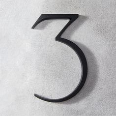 the number five is made out of black metal