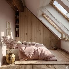 a bed sitting under a window in a bedroom next to a wooden floor and wall