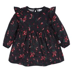 The perfect addition to your baby girl or toddler girl's wardrobe, this pack of two winter themed dresses includes one in red and one black with holly berries. Made primarily from cotton with spandex at the trim for a slight stretch at the neck, wrists and hem, this loose fitting dress fits comfortably and looks adorable. Shoulder ruffles add an elegant final touch. Our essentials have been independently certified with STANDARD 100 by OEKO-TEX® so that you don’t have to worry about harmful subst Themed Dresses, Baby Bullet, Babydoll Dresses, Baby Size Chart, Girls Thanksgiving, Gerber Baby, Cotton Sleepwear, Baby Trend, Fitting Dress