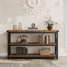 a book shelf with books on it in front of a white wall and a clock