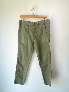 The Great Green Pants! Super soft cotton blend with a button fly and high rise waist. Made in USA. Marked a size 26, but fit larger, please refer to measurements. In excellent condition! Approx. Measurements: Waist: 32" Rise: 12" Inseam: 25" Casual Cotton Cargo Pants With Buttons, High Waist Utility Pants With Buttons, Relaxed Fit Cotton Jeans With Buttons, High-waisted Cotton Bottoms With Button Zip Fly, High Waist Cotton Utility Work Pants, Relaxed Fit Cotton Work Pants With Button Closure, High Waist Utility Cotton Work Pants, Wide Leg Cotton Bottoms With Button Zip Fly, High Waist Khaki Cotton Jeans