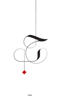 the letter s is hanging from a wire with a red square in it's center