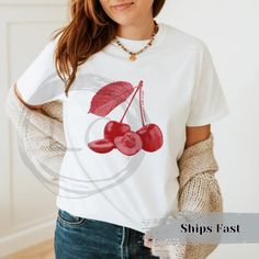 "Cute cherry shirt 90s aesthetic gift, the perfect cozy vintage style Y2K T-Shirt fruit graphic tee present with red cherries and text on front across chest. Design is in a grunge vintage texture of a whole pair of cherry and a sliced one along with textured leaf. Along one stem of the cherry is \"wild like cherries\" bring a bit of coquette feel to the shirt. \"NO VINAYL IN HERE\"  These cozy tees are made from cotton specially spun fibers provide smooth surface, No side seams mean there are no itchy interruptions under the arms. The shoulders have tape for improved durability. Runs true to size, but size up x2 if you'd like a more oversized fit. .: 100% cotton (fiber content may vary for different colors) .: Medium fabric (5.3 oz/yd² (180 g/m .: Classic fit .: Tear-away label All T-shirt Retro Cherry Print T-shirt For Summer, Y2k T-shirt With Cherry Print, Y2k Cherry Print Summer T-shirt, Y2k Style Cherry Print Summer T-shirt, Y2k Style Cherry Print T-shirt For Summer, Y2k Crew Neck T-shirt With Cherry Print, Casual Cherry Short Sleeve Tops, Casual Cherry Print T-shirt, Casual Cherry Summer Tops