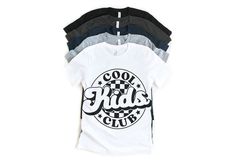 Join the Cool Kids Club with this trendy tee! Soft, durable, and stylish with a fun checkered design. Perfect for every little trendsetter! 🌟👕 Plaid Cotton Tops With Letter Print, Casual Plaid T-shirt With Graphic Print, Retro Plaid Top With Graphic Print, Cool Kids Club, School Spirit Shirts, Husky Mom, Checker Design, Checkered Design, Spirit Shirts