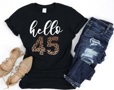 45 Leopard Birthday Shirt 45th Birthday Gift For Women, 45th Birthday Shirts, Hello 45 Tee, 45th Birthday, 45th Birthday Gift, 45 Birthday Shirt, 45th Birthday Party, 45th T-Shirt HOW TO ORDER: 1. Please, Check and Review all Photos. (Crewneck T-Shirts Are Unisex. V-neck T-Shirts Are Women Size. Please, Check the Size Charts Before Ordering) 2. Select Your T-Shirt Size/Color and Text Color from drop down menus. 3. Choose Your Quantity as much as you want. 4. Click "Add To Cart". For multiple ite Leopard Birthday, 45th Birthday Gifts, 55th Birthday Gifts, 40th Birthday Gifts For Women, 65th Birthday Gift, 30th Birthday Shirts, 40th Birthday Shirts, 80th Birthday Gifts, Leopard Shirt