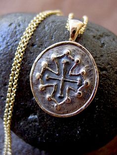 Occitan Cross necklace by VisaVisJewelryLA on Etsy Medieval Engraved Round Pendant Jewelry, Medieval Cross Pendant Necklace Gift, Medieval Medallion Jewelry Gift, Medieval Medallion Jewelry As A Gift, Hand Cast Medieval Necklace For Gift, Medieval Hand Cast Necklaces For Gift, Handmade Medieval Round Pendant Necklace, Medieval Style Gold Engraved Necklace, Medieval Hand Cast Necklace For Gift