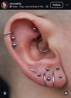 a person with piercings on their ear