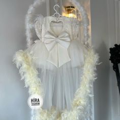 "White Baby Ribbon Long Train Wedding Girl Dress"  Make your little angel's wedding dreams come true with this enchanting White Baby Ribbon Long Train Wedding Girl Dress!  Let her be the star of the show and create magical memories that will last a lifetime. 🌟💖 🌸 Features: 👗 Elegant and flowing long train for a fairy tale look 🎀 Delicate ribbon detailing for a touch of sophistication 🌺 Soft and comfortable fabric for hours of joyous celebration 💕 Beautifully designed to capture hearts and Puffy Tulle Dress, Baby Band, Feathers Wedding, Train Wedding, Joyous Celebration, Wedding Girl, Feather Wedding, Dress Birthday, Wedding Dresses For Girls