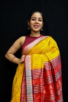 Exclusive hand-woven Sambalpuri silk saree with Pasapali Finest pure handwoven sambalpuri ikat silk saree with traditional motifs woven by the master weavers of Sambalpur, Odisha. It has lovely patterns and is world-famous for its stunning colours, texture and designs. Occasion: Party Wear Fabric: Sambalpuri Primary Color:  Yellow Secondary Color: Maroon Material: Mulberry Silk/ Sambalpuri Silk Pattern: Motif Border Type: Ikkat Border Size: Medium Blouse Piece: Included Care: Dry Clean Disclaime Tussar Silk Blouse Piece For Festivals And Rituals, Festive Multicolor Blouse With Woven Motifs, Handloom Chanderi Blouse Piece For Rituals, Fusion Style Dupatta With Pallu For Puja, Multicolor Blouse Piece With Woven Motifs For Festivals, Tussar Silk Blouse Piece For Rituals And Festivals, Multicolor Banarasi Silk Saree For Rituals, Traditional Banarasi Silk Saree With Ikat Print, Traditional Yellow Handloom Blouse Piece