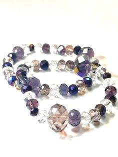 Handmade with glass beads captures different shades of purples and clear Lavender Beaded Bracelet, Purple Beaded Bracelets, Multiple Bracelets, Purple Hues, Classic Elegance, Work Attire, Shades Of Purple, Royalty, Everyday Outfits