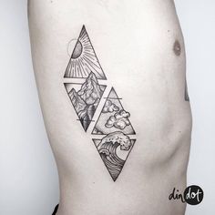 a woman's stomach with an abstract tattoo design on her side, which features mountains and waves