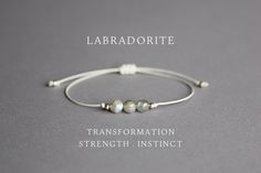 This 6 mm labradorite bracelet (grade AA) is a perfect addition to your look and a great gift idea! MORE LABRADORITE JEWELRY: https://www.etsy.com/shop/YPCrystalJewelry?search_query=labradorite SPACER BEADS SIZE: - Stainless steel in silver color: 2.5mm x 2.5mm - Stainless steel in gold color: 2mm x 1.5mm - 925 sterling silver: 2.5mm x 2.5mm - 24K gold plated sterling silver: 2.5mm x 2.5mm - Rose gold plated brass: 2.5mm x 2.5mm HOW TO MEASURE: Choose your bracelet size by wrapping a string arou Minimalist Adjustable Gray Jewelry, Adjustable Minimalist Gray Jewelry, Minimalist Gray Adjustable Jewelry, Minimalist Adjustable Labradorite Jewelry, Adjustable Moonstone Bracelets For Everyday, Elegant Adjustable Labradorite Beaded Bracelets, Elegant Labradorite Beaded Bracelets, Minimalist Adjustable Gray Bracelet, Rhodochrosite Jewelry