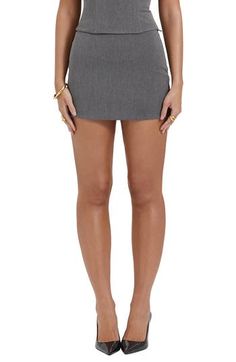 With a short length and a strikingly simple silhouette, this miniskirt expertly balances classy polish with showy intrigue. Exclusive retailer Lined 63% polyester, 33% viscose, 4% elastane Dry clean Imported Formal Spring Mini Skort, Formal Spring Mini Length Skort, Formal Mini Skirt Skort For Summer, Formal Mini Skort For Summer, Formal Summer Mini Skort, Formal Mini Skirt For Summer, Lined Mini Length Skort, Fitted Party Skort With Short Inseam, Elegant Fitted Mini Shorts