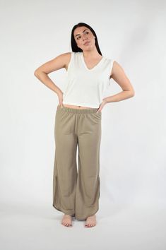 The chicest pair of lounge pants around! Our Casey lounge pants take your loungewear to the next level. Soft, comfortable, and so easy to style - everyone needs a pair of these. The lounge pants are comfy and cute making the perfect casual outfits. Features: Curve Hem Elastic Waist Model is wearing a medium. Height 5'8", Bust 35", Waist 28.5", Hip 34.5" Fabric content: 45% Nylon : 55% Rayon Wide Leg Stretch Harem Pants For Leisure, Comfortable Stretch Harem Pants For Loungewear, Stretch Wide Leg Harem Pants For Leisure, Versatile Yoga Pants For Spring Loungewear, Spring Yoga Pants For Loungewear, Summer Ankle-length Yoga Pants For Loungewear, Ankle-length Yoga Pants For Summer Loungewear, Versatile Loose Fit Harem Pants For Loungewear, Summer Athleisure Harem Pants For Loungewear