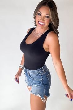 Get ready to look and feel fabulous in our Cotton V-Neck Cropped Cami Top. This fitted top is not only smoothing, but also bra strap friendly, making it perfect for any occasion. Comfort and style all in one, this top will be your new go-to! Fit: She is wearing her true size medium. Fits true to size. If in between sizes, size up.