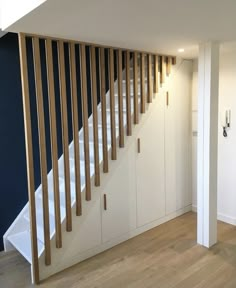 the stairs are made from wood and have been painted white