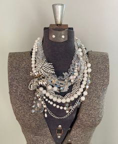 * This is a CUSTOM ORDER, please allow 2-3 weeks for creation! I will be in contact with you the entire time as you choose what specialized rhinestone pieces you want in your unique statement piece made just for you. * How stunning is this ivory white pearl and crystal necklace?!  There are a ton of sparkles in this lovely ensemble!  Repurposed rhinestone pieces dating from the 1940s-60s are used throughout the piece to give it a unique sparkle unlike rhinestone pieces created today.  The vintag Dazzling White Necklace With Rhinestones, Wedding Necklaces With Rhinestones, White Rhinestone Necklace With Bling Style, White Rhinestone Jewelry For Jewelry Making, White Crystal Necklace With Bling, White Rhinestone Jewelry, Glamorous White Bling Necklace, Unique Party Jewelry With Bling, White Crystal Bling Necklace