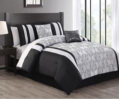 black and white comforter set in a bedroom