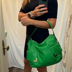 Beautiful Michael Kors Shoulder Bag In Bright Green Color. I Worn It Maybe Twice, It Is In Like New Condition. Only Flaw Is Missing A Stitches On One Of The Pocket As Pictures Shown, But You Can’t Really See It Till You Pull The Pocket. I Never Noticed Till Now I Was Taking A Pictures. :( Designer Green Satchel For Everyday, Designer Green Everyday Satchel, Designer Green Shoulder Bag For Travel, Michael Kors Rectangular Satchel With Handle Drop, Designer Green Shoulder Bag With Leather Handles, Michael Kors Satchel Shoulder Bag With Handle Drop, Michael Kors Everyday Satchel With Double Handle, Michael Kors Double Handle Satchel For Everyday, Michael Kors Tote Satchel For Everyday Use