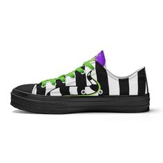 Take your style game to the next level with the Beetlejuice Sandworm Low Top Canvas Sneakers from TimeElements.shop. Inspired by the cult classic film, these sneakers feature a modern, bold design that expresses your love for the spooky and unconventional. Crafted with quality materials, the boots are comfortable and and long-lasting, making them ideal for everyday wear. With their unique, edgy style, you will make a statement wherever you go - be it a concert or just out on the town. Make sure Green Low-top Sneakers With Graphic Print, Halloween Sporty Low-top Sneakers, Sporty Low-top Halloween Sneakers, Graphic Print Low-top Canvas Shoes For Streetwear, Casual Halloween Skateboarding Sneakers, Casual Custom Halloween Sneakers With Round Toe, Casual Halloween Sneakers With Rubber Sole, Beetlejuice Sandworm, Canvas Sneakers Womens