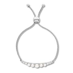 Graduated freshwater cultured pearls fan out on either side of this delightful bolo bracelet for her. Lab-created white sapphires add a splash of shimmer to the bracelet. The sterling silver wheat chain fastens with an bolo clasp that adjusts up to 9 inches in length. Mens Link Bracelet, Mens Diamond Bracelet, Cultured Pearl Bracelet, Bracelet For Her, Jewelry Advice, Bolo Bracelet, Black Sapphire, White Bracelets, Sapphire Bracelet