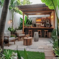 an outdoor bar and seating area with potted plants in the back ground, surrounded by greenery