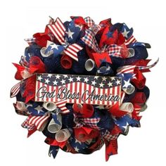 red, white and blue wreath with the word god bless america written on it's side