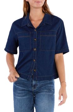 Made from supersoft denim, this casual button-up shirt features a boxy fit and contrast stitching to highlight the dark-indigo wash. Front button closure Spread collar Short sleeves Chest patch pockets 65% cotton, 35% lyocell Machine wash, tumble dry Imported Collared Indigo Denim Top With Button Closure, Indigo Collared Denim Top With Button Closure, Button-up Denim Blue Shirt, Dark Wash Denim Top For Work With Button Closure, Dark Wash Denim Top For Workwear, Dark Wash Button-up Denim Top With Pockets, Dark Wash Denim Button-up Top With Pockets, Relaxed Fit Indigo Denim Top With Button Closure, Relaxed Fit Denim Blue Top With Button Closure