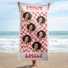 a woman standing on the beach holding up a towel with four photos of her friends