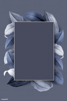 an empty square frame with blue leaves around it on a gray background for text or image