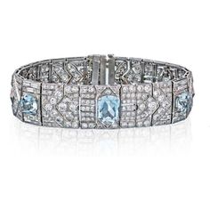 Indulge in the exquisite allure of our French Art Deco Platinum Aquamarine and Diamond Carpet Bracelet! This stunning piece encapsulates the glamour and elegance of the Art Deco era, transporting you to a world of opulence and sophistication.Handcrafted with meticulous attention to detail, this bracelet features a breathtaking arrangement of three light blue aquamarines set in the most beautiful platinum setting. The captivating aquamarines radiate a soothing and refreshing energy, reminiscent o Art Deco Accessories, Aquamarine Bracelet, Aquamarine Jewelry, Filigree Design, Platinum Metal, French Art Deco, Art Deco Diamond, Art Deco Era, Bracelet Crafts