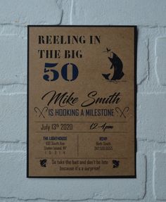 a sign on the side of a white brick wall that says, feeling in the big 50 mike smith is holding a melt stone