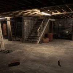 an empty room with stairs and other items