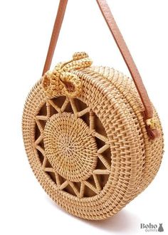 Bohemian round shoulder bag in straw with star decoration This boho shoulder bag is a summer wardrobe must-have when paired with a long flowered dress and sandals. We adore its unique design and starry decoration, which is reminiscent of the 1970s. This bohemian bag in braided straw is worn as a shoulder bag and closes with a lovely buckle. The interior is lined in polyester fabric and has a big compartment for storing personal items. BAG DETAILS Type of bag: shoulder bag Size: 20 cm diameter an Dress And Sandals, Round Shoulder Bag, Boho Shoulder Bag, Flowered Dress, Bohemian Bag, Bohemian Bags, Bag Details, Star Decorations, Types Of Bag