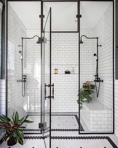 the instagram page shows an image of a bathroom with white tiles and black fixtures