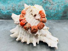 A stunning set of antique coral beads at a very good prize! These large mediterranean coral beads are a must have for your tribal and ethnic jewelry projects!  For more sets, click here: https://etsy.me/3MuEq24 ✔️ Shape: tube beads ✔️ Weight: 25 grams ✔️ Size bead: 10-17 mm, diameter 10-14 mm ✔️ Total length: ca 11,50 cm ✔️ Origin: Mediterranean Sea ✔️ Condition: very good, consistent with age and use ✔️ The beads will be carefully wrapped. Track and trace is an option at checkout. ✔️ For any fu Handmade Bohemian Red Coral Beads, Bohemian Red Coral And Wooden Beads, Orange Bohemian Red Coral Beads, Bohemian Orange Red Coral Beads, Bohemian Red Coral Beads For Jewelry Making, Bohemian Coral Gemstone Beads, Bon Prix, Coral Beads, Mediterranean Sea