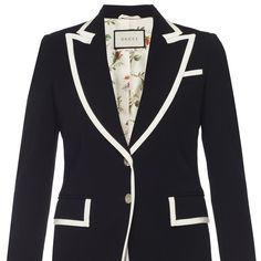 Add A Dash Of Gucci Glamour To Your Wardrobe With This Sophisticated Blazer From The Iconic Brand’s Ss18 Collection. Gucci Black Cady Blazer With White Trim 2 Button Fastening Peaked Lapels 3 Slip Pockets Cuffs With Buttons Double Vent At Rear Floral Silk Lining Size 38 Product Number 500010 Made In Italy Gucci Classic Blazer For Spring, White Gucci Outerwear For Spring, Tailored Gucci Outerwear For Spring, Luxury Gucci Blazer With Notch Lapel, Classic Gucci Blazer For Spring, Gucci Designer Blazer For Work, Designer Gucci Blazer For Workwear, White Gucci Outerwear For Work, Luxury Gucci Blazer For Spring